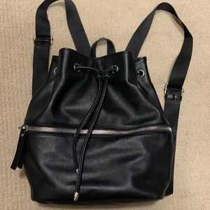 Clarks backpack purse. Black. Drawstring closure at top. Excellent condition.